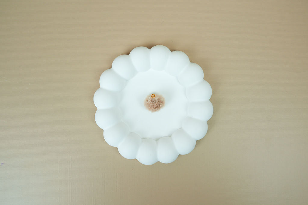 Beige pompom