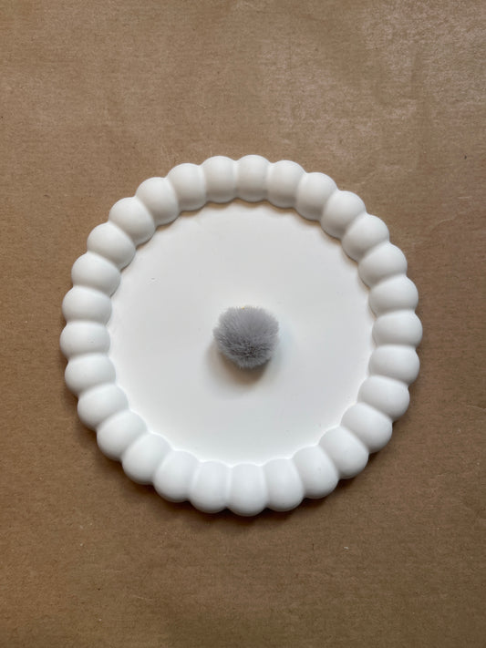 Grey pompom