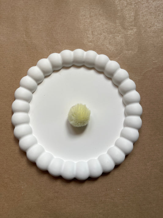 Pastel yellow pompom
