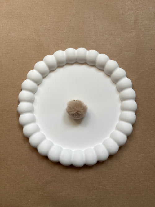 Beige pompom
