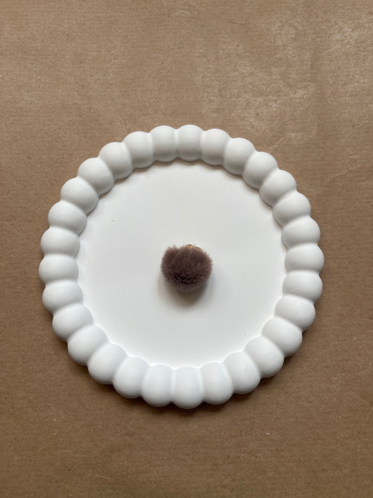 Brown pompom