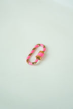 The carabiner ring with lock system (pink and gold)