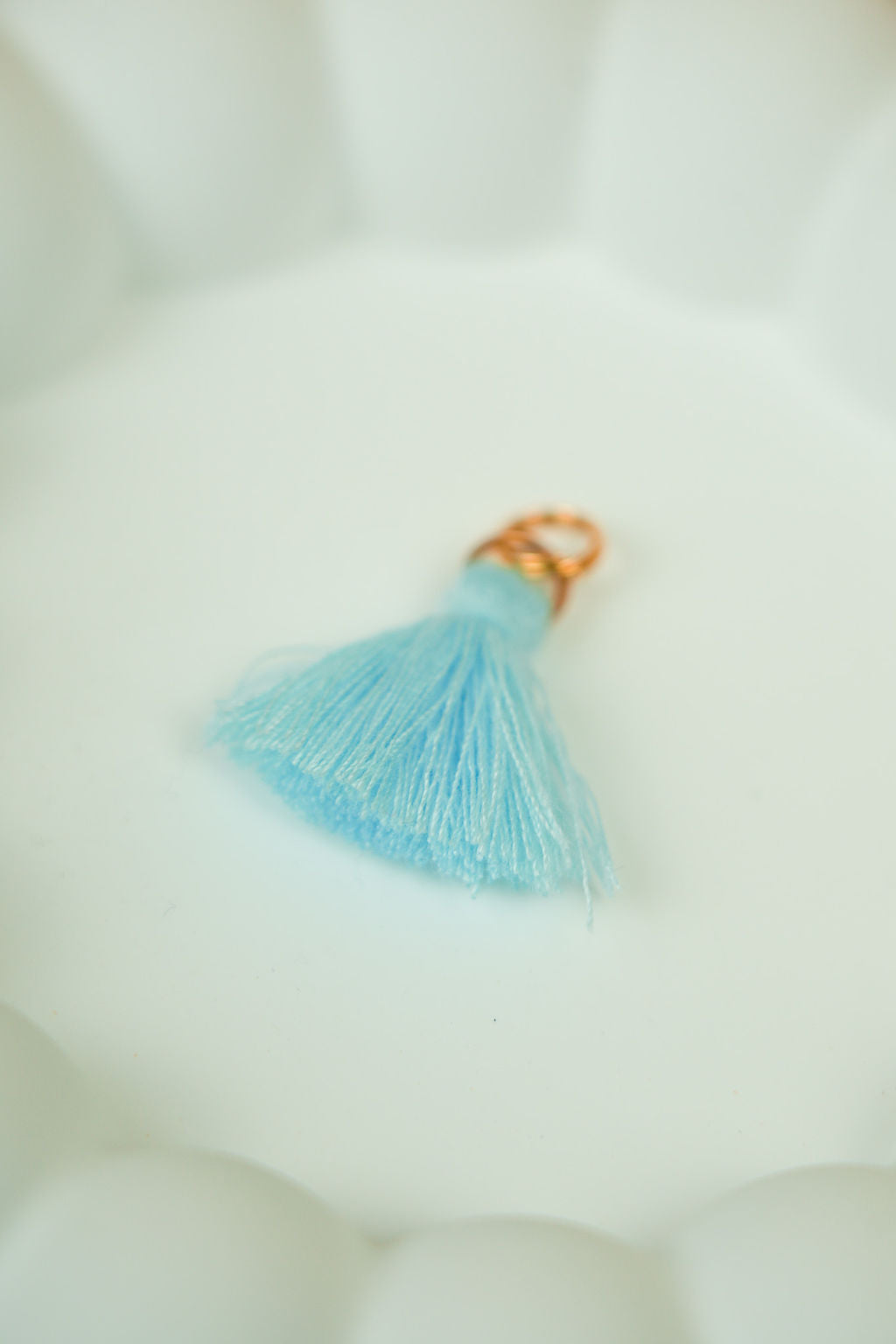 Light blue tassel (gold)