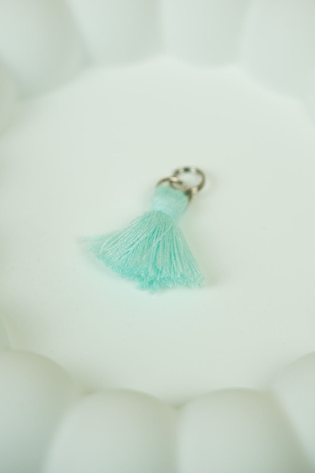 Light blue tassel (silver)