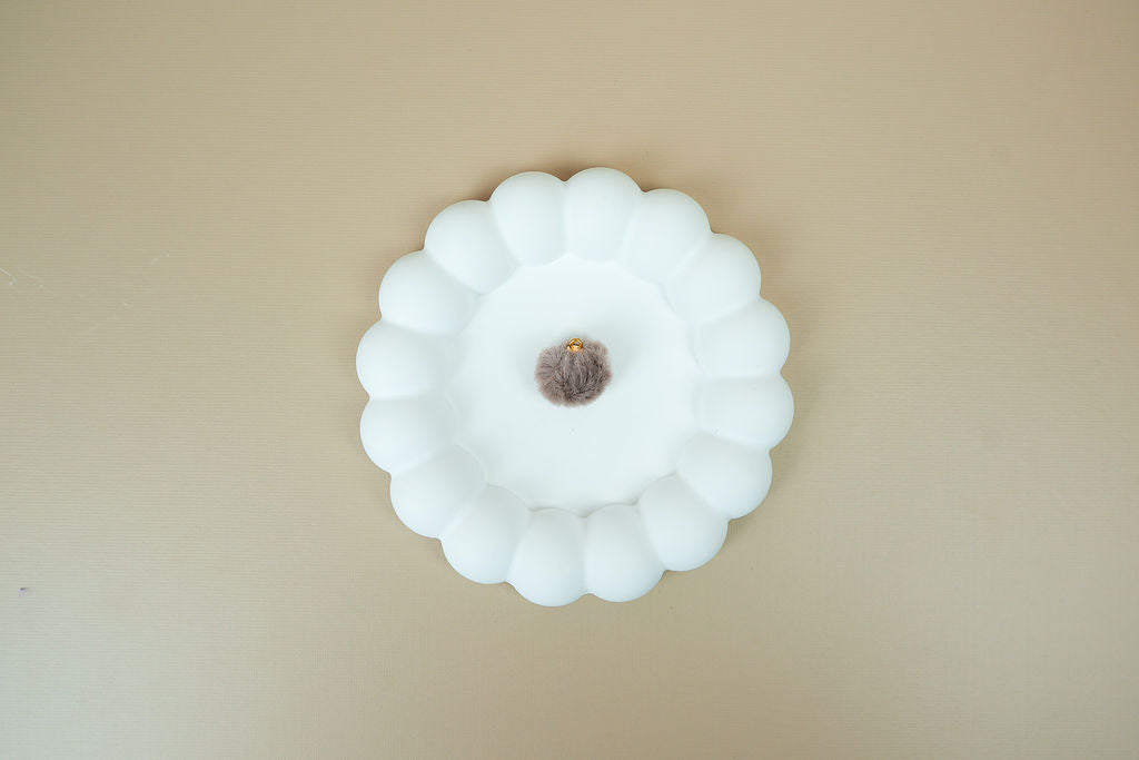 Brown pompom