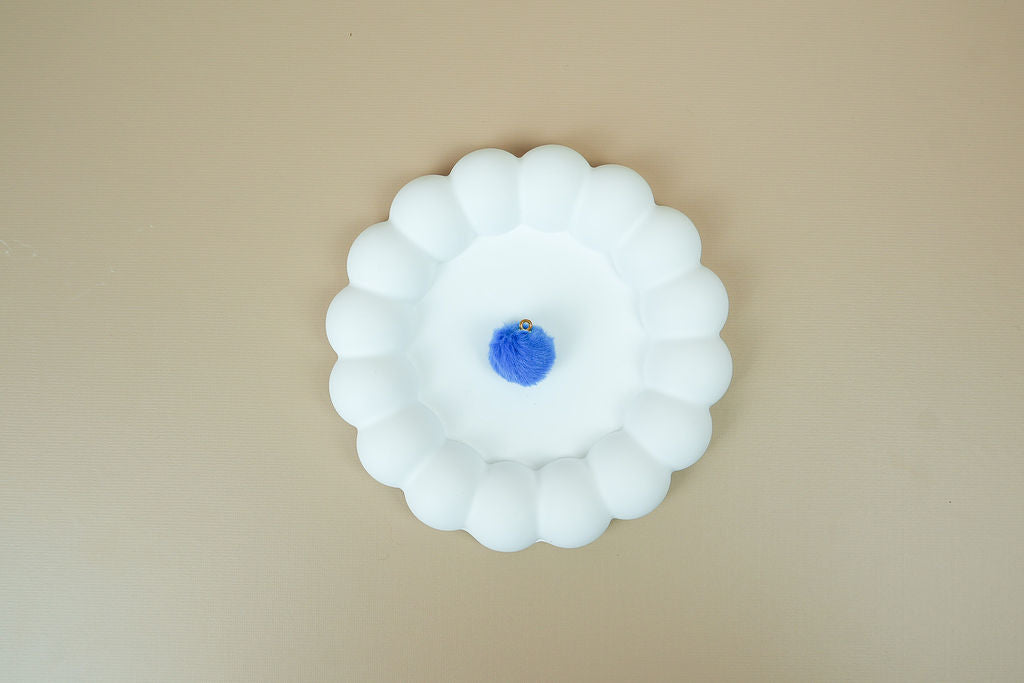 Dark blue pompom