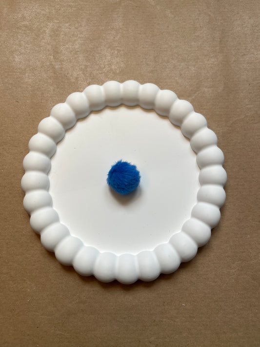 Dark blue pompom